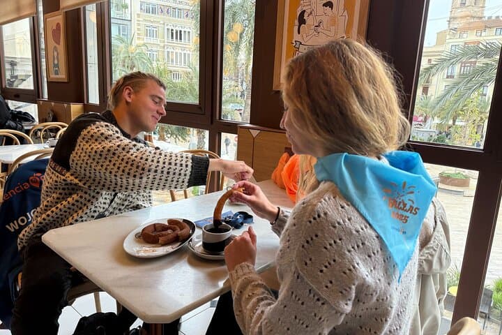 Enjoying hot chocolate with porras (available on March 13th, 14th and 15th)
