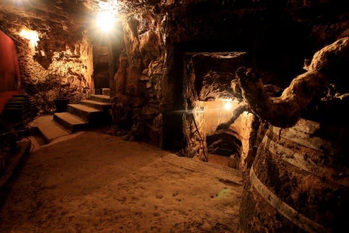 Discover the ancient winemaking secrets preserved in our historic family caves.