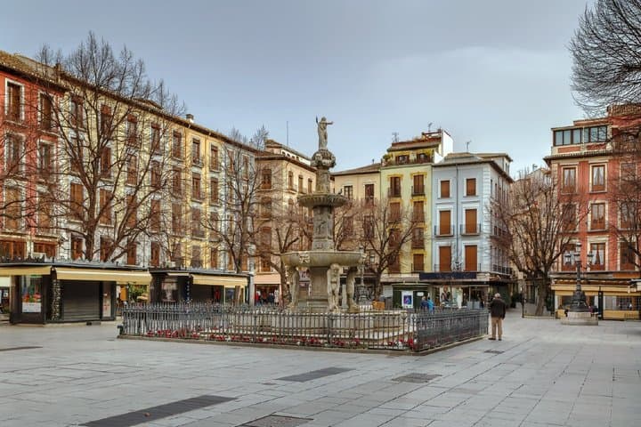 Place Bib-Rambla: The vibrant and historic heart of the lower town with its famous Fountain of Giants (Fuente de los Gigantones).
