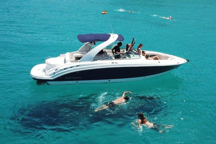 Private 7-hour boat ride from Sant Antoni de Portmany