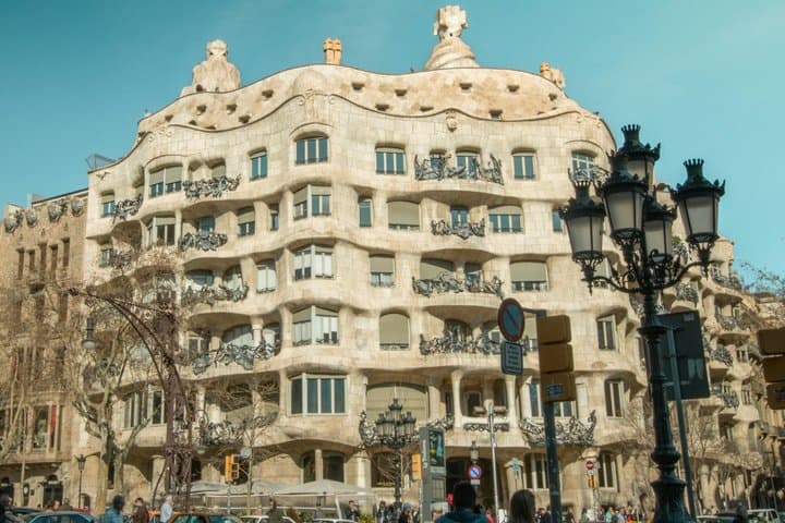 Casa Milà shows Gaudi’s bold break from convention. Its flowing stone façade and twisted iron balconies feel alive. Nicknamed La Pedrera (“the quarry”), do you think the name fits?