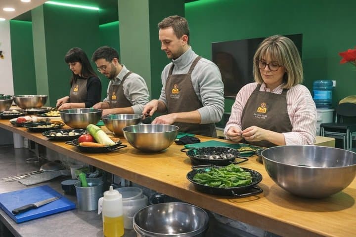 Paella workshop with market visit and oil tasting