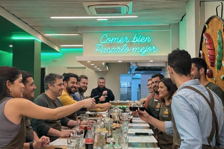 Paella workshop with market visit and oil tasting