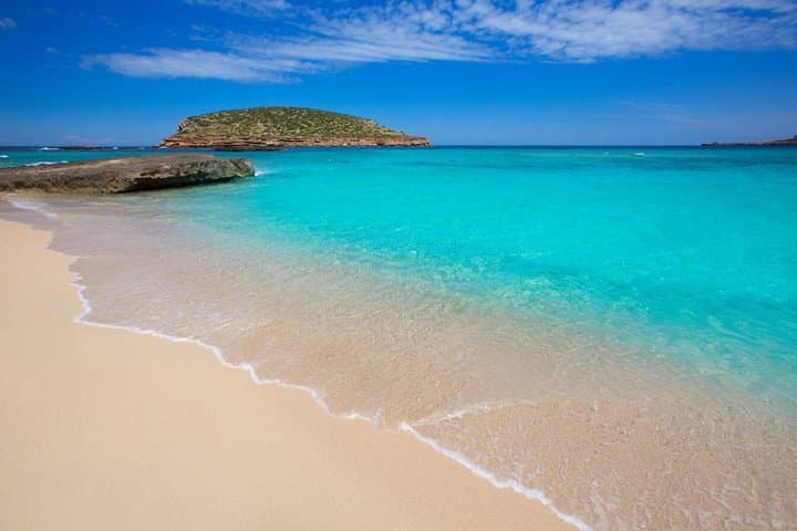 Ibiza Beach Hopper with Lunch Open Bar Paddle Surf and Snorkeling