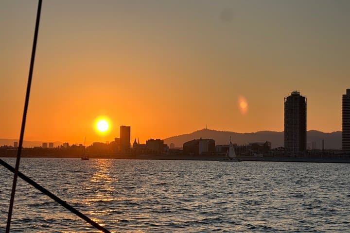 Sunset boat tour of Barcelona with open bar cava
