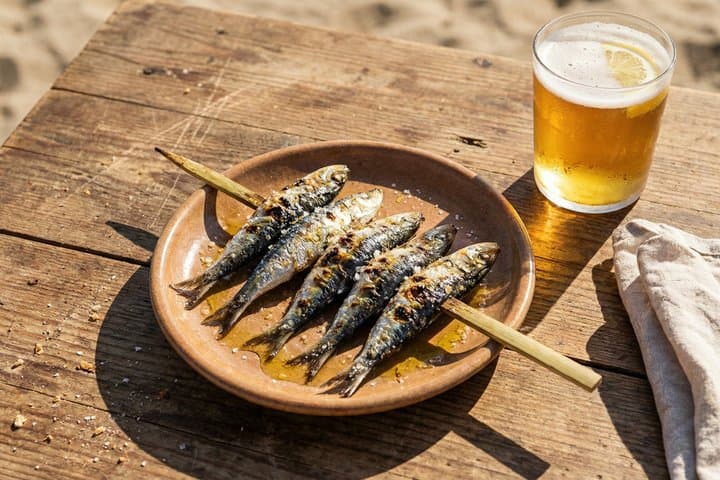 Malaga Bike Tour: Fresh Grilled Sardines & Beachside Tasting