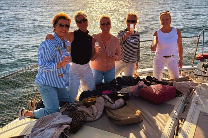 Dolphin Searching Sunset Cruise with Bottle of Cava & Snacks