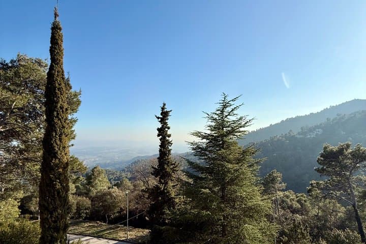 From Barcelona: Thermal Baths & Scenic Mountain Walk