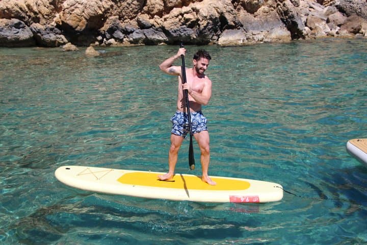 2.5 hour boat trip with snorkeling and paddle surfing in coves