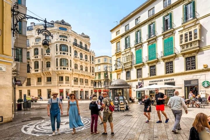 From Torremolinos Malaga Walking Tour Hotel Pickup and Gift