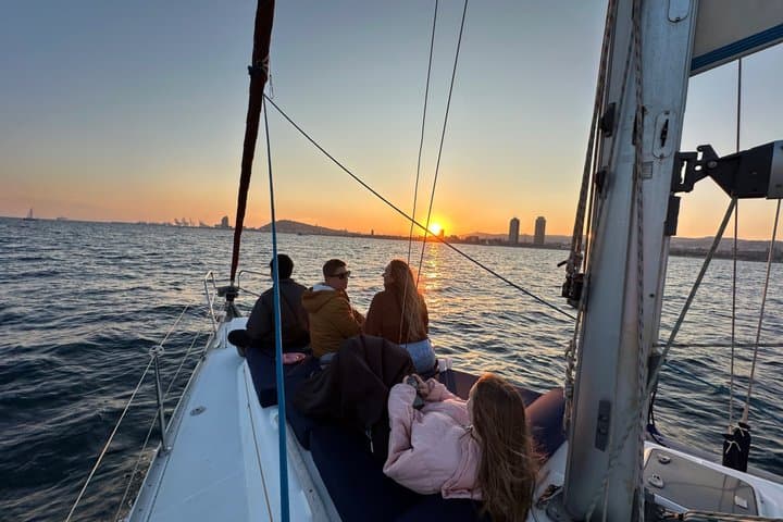Sunset boat tour of Barcelona with open bar cava