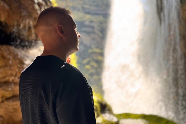Trip from Barcelona: Mountains, Waterfall & Cliffside Monastery
