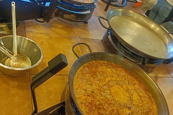 Madrid : Paella and Churros cooking class, ham and wines tasting