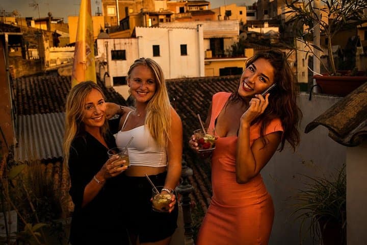 Sunset rooftop paella with local chef in palma