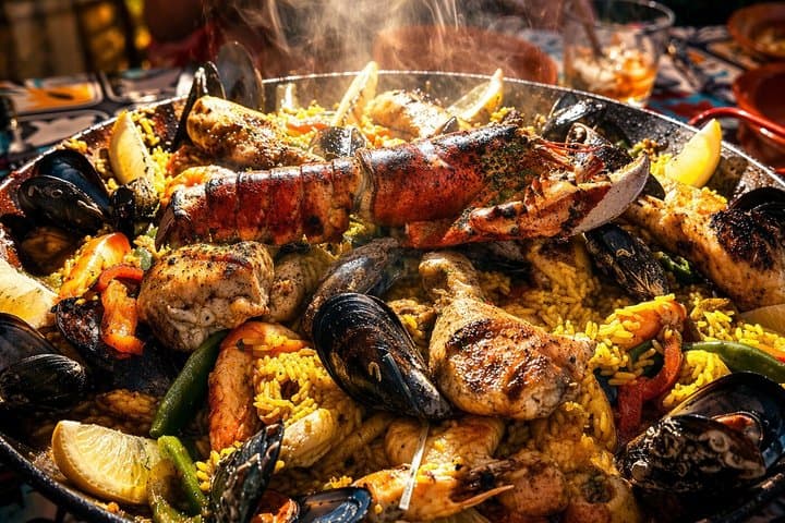 Sunset rooftop paella with local chef in palma