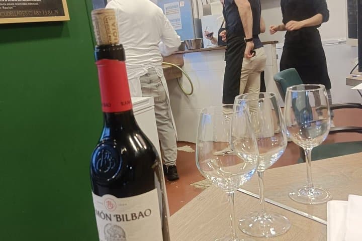 Madrid : Paella and Churros cooking class, ham and wines tasting