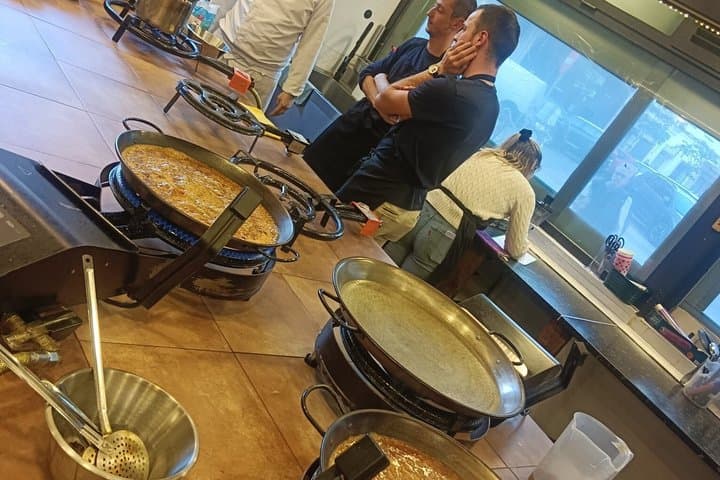 Madrid : Paella and Churros cooking class, ham and wines tasting