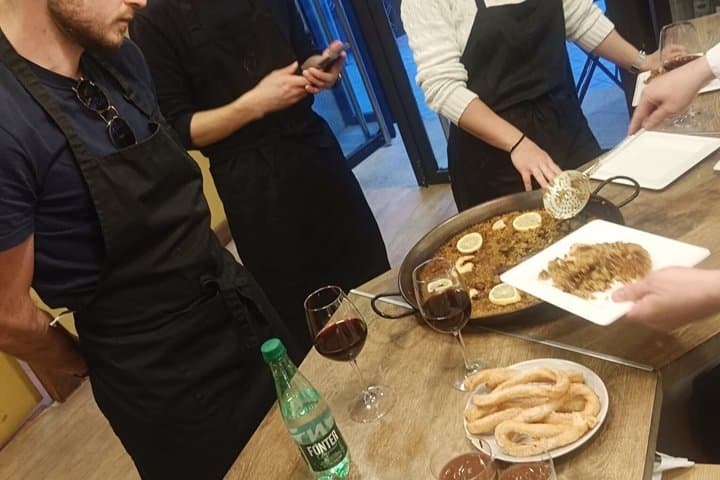Madrid : Paella and Churros cooking class, ham and wines tasting