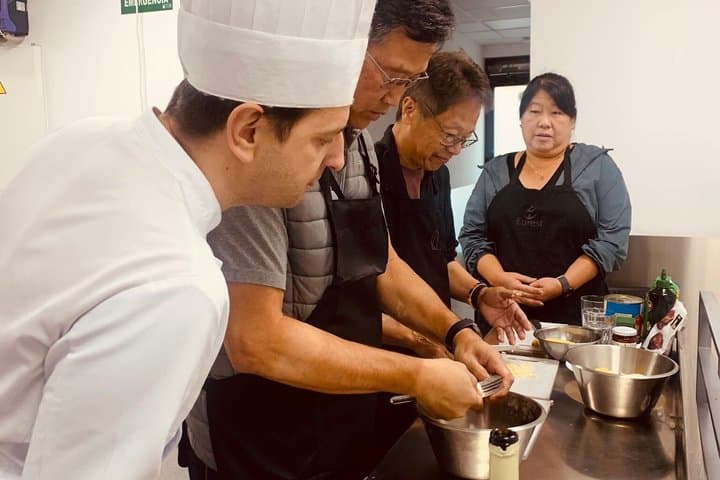 Madrid : Paella and Churros cooking class, ham and wines tasting