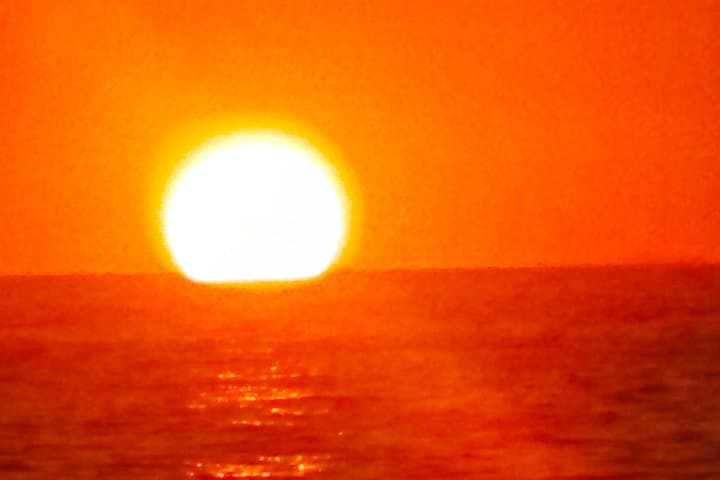 Ibiza Sunset with a Catamaran