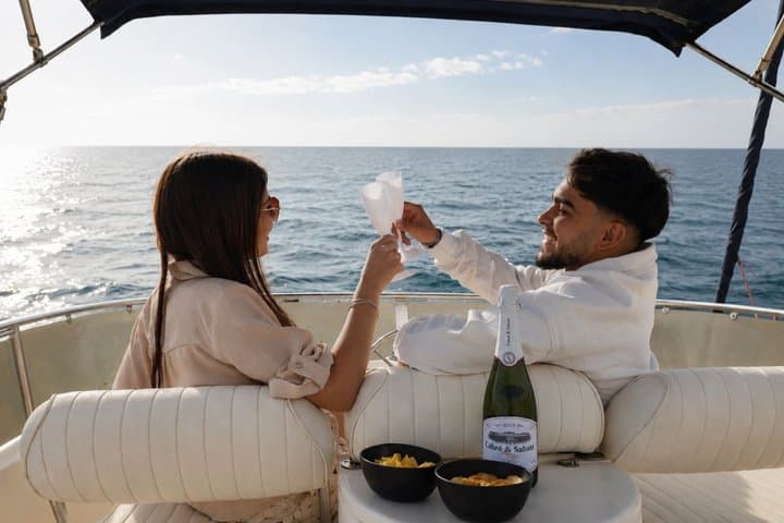 Sunset on Luxury Yacht Includes a Drink