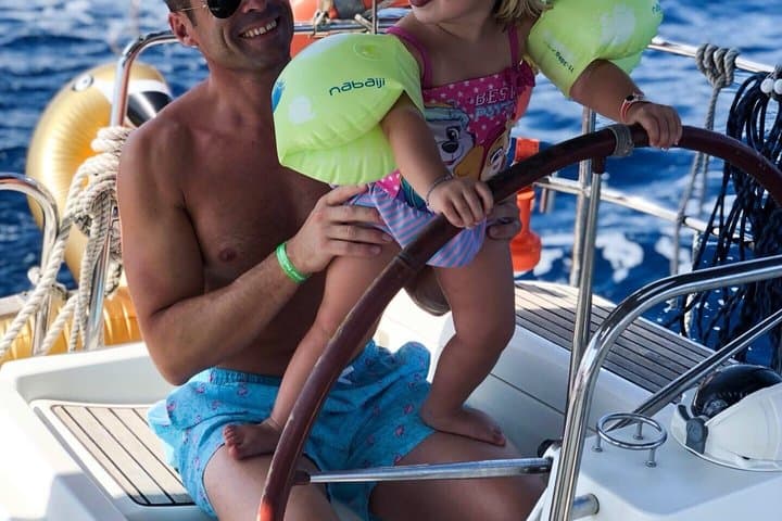 Barcelona Day & Sunset Sailing: Open Bar, Local Tapas & Swim