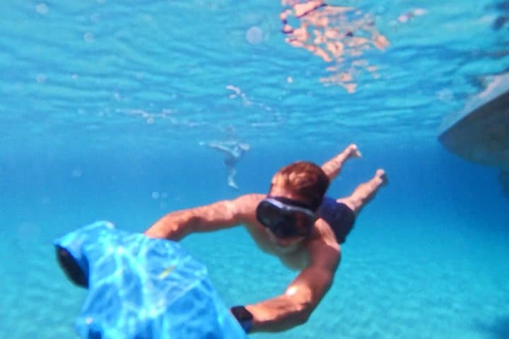 Ibiza Boat Tour with Snorkeling Drinks and Paddle Surfing