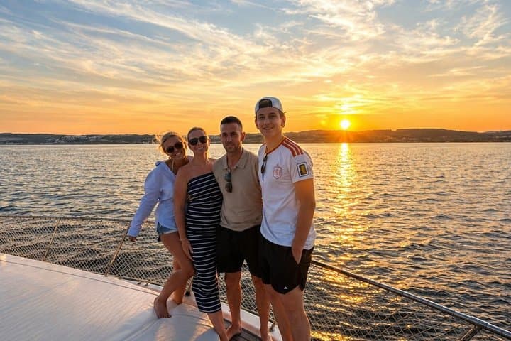Dolphin Searching Sunset Cruise with Bottle of Cava & Snacks