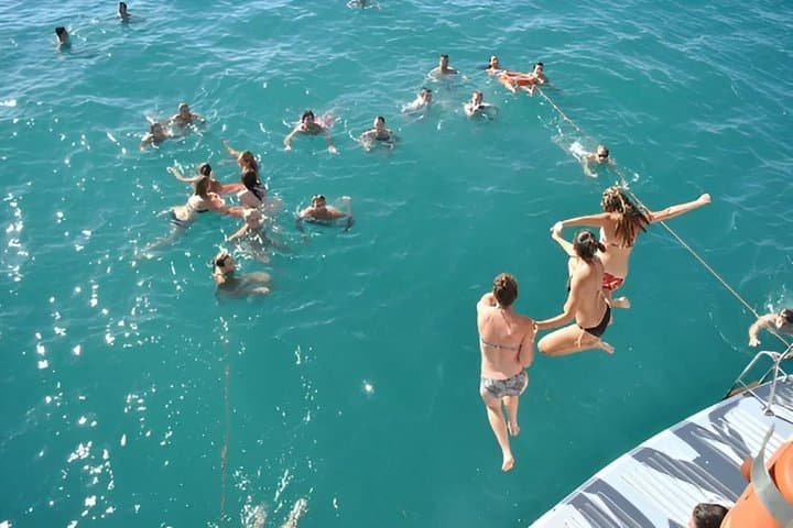 A day at sea in Cala Blanca with paella and jet ski