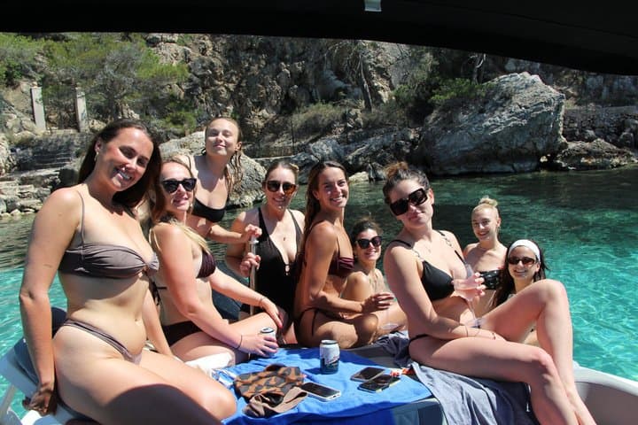 2.5 hour boat trip with snorkeling and paddle surfing in coves