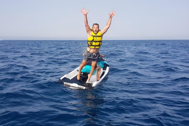 A day at sea in Cala Blanca with paella and jet ski