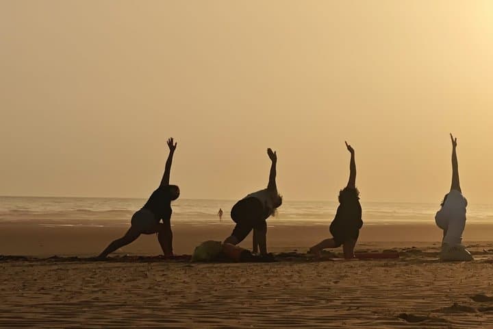 Yoga at sunrise and sunset on Berria Beach