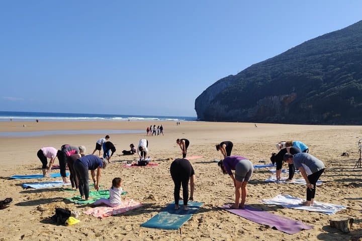 Yoga at sunrise and sunset on Berria Beach