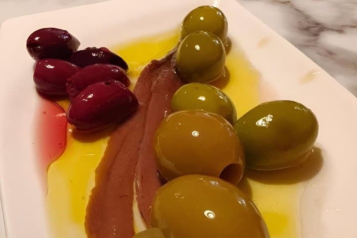 Flavors of Modernisme through Tapas Paella Vermouth and History