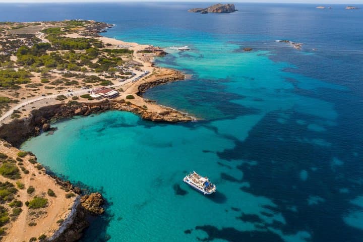Sunset Beach Hopping Cruise, Cala Comte and Cala Bassa, SUP and snorkelling