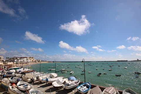 Stroll along La Caleta beach, Cadiz on this shore excursion