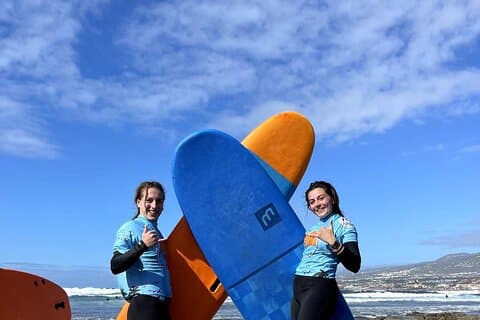 Foam boards, neoprene and surf boots for beginners
