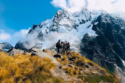 Trekking beneath snowy peaks