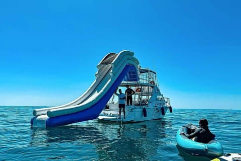 Benalmadena: Private Boat with Slide, Snorkeling and Activities