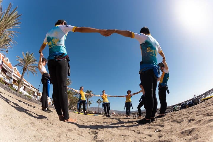 Starting the warm up before the surf lesson