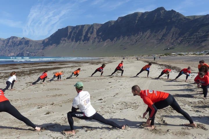 Surf class in Famara 9:15-12:00 or 11:45-14:30 (2h class)