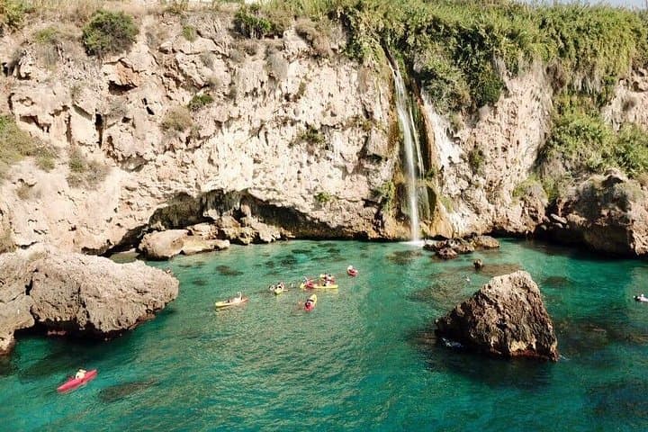 Aerial view of the Maro Waterfall. Kayak route Nerja-Maro Waterfall.