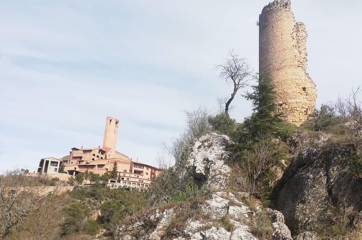 Torreciudad shrine and the old tower built during the Muslim occupation.