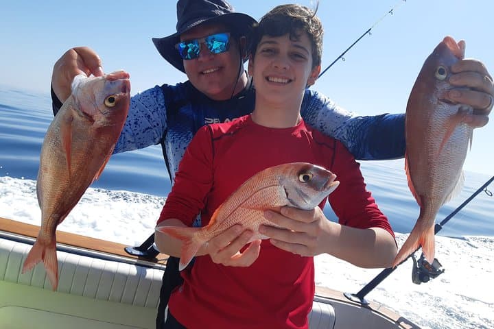 Red snapper fishing. The children enjoy a lot and have a great time with the activity of boat fishing