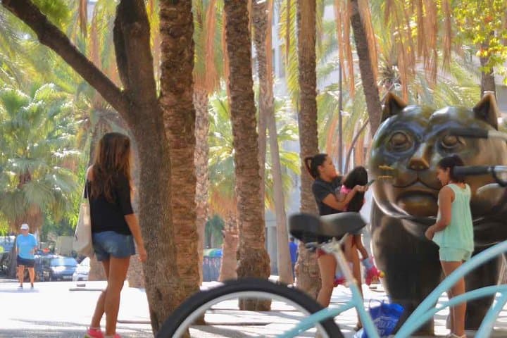 Rambla de Raval with the fat cat by Botero, sights you'll see during the bike tour