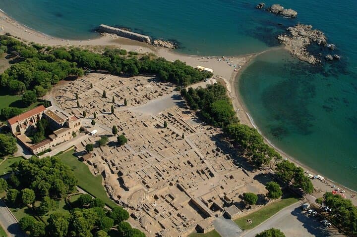 Costa Brava and Empuries Small Group Tour with Hotel Pick-Up and Boat Ride