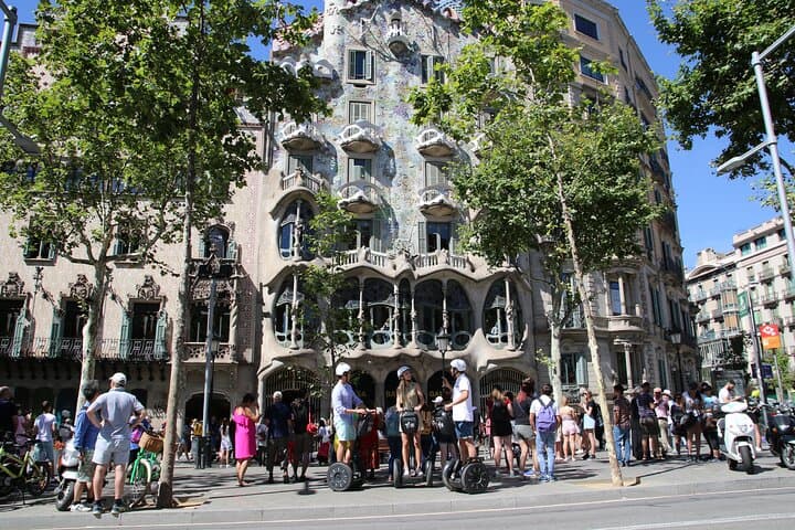 Cruising by Casa Batlló on a Gaudí-themed Segway tour