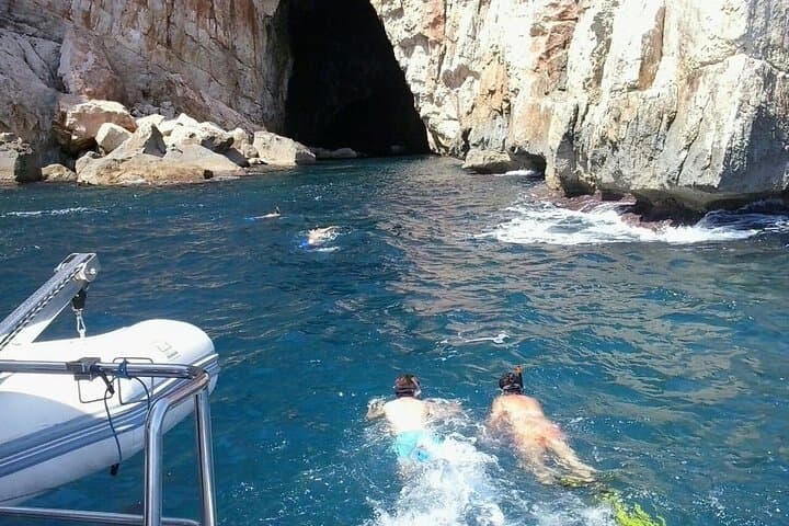 Bathe in a cove that is only accessible from the sea