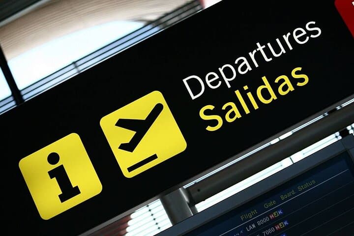 driver waiting for you with a name sign inside the terminal