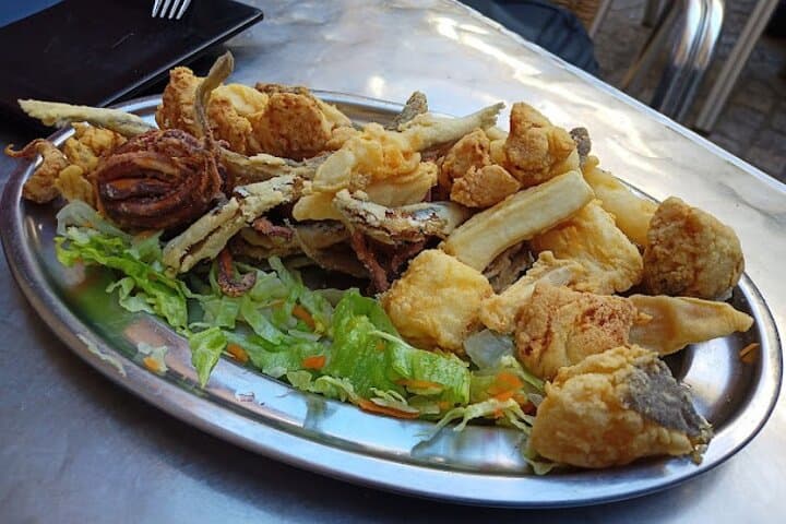 Private food tour in a local Seville neighborhood